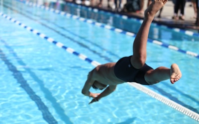 Child swimming in pool